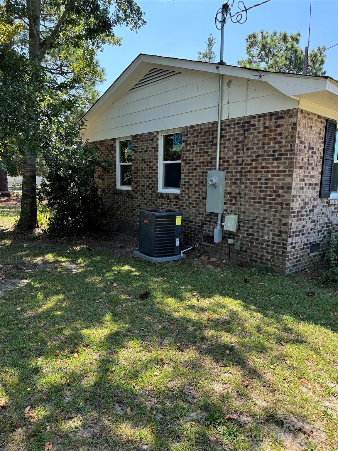 131 Kristy Lane Rockingham, NC 28379 - Photo 2 of 35 a backyard of a house with lots of green space