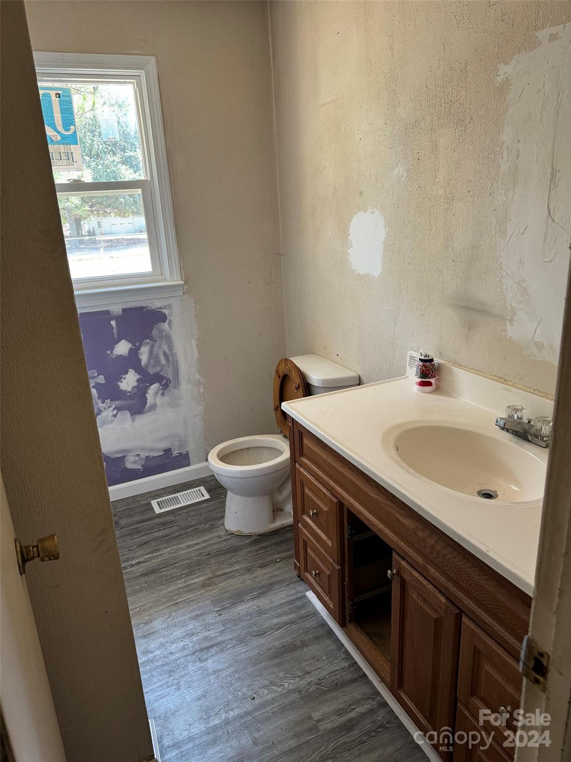 131 Kristy Lane Rockingham, NC 28379 - Photo 21 of 35 a bathroom with a sink and a mirror