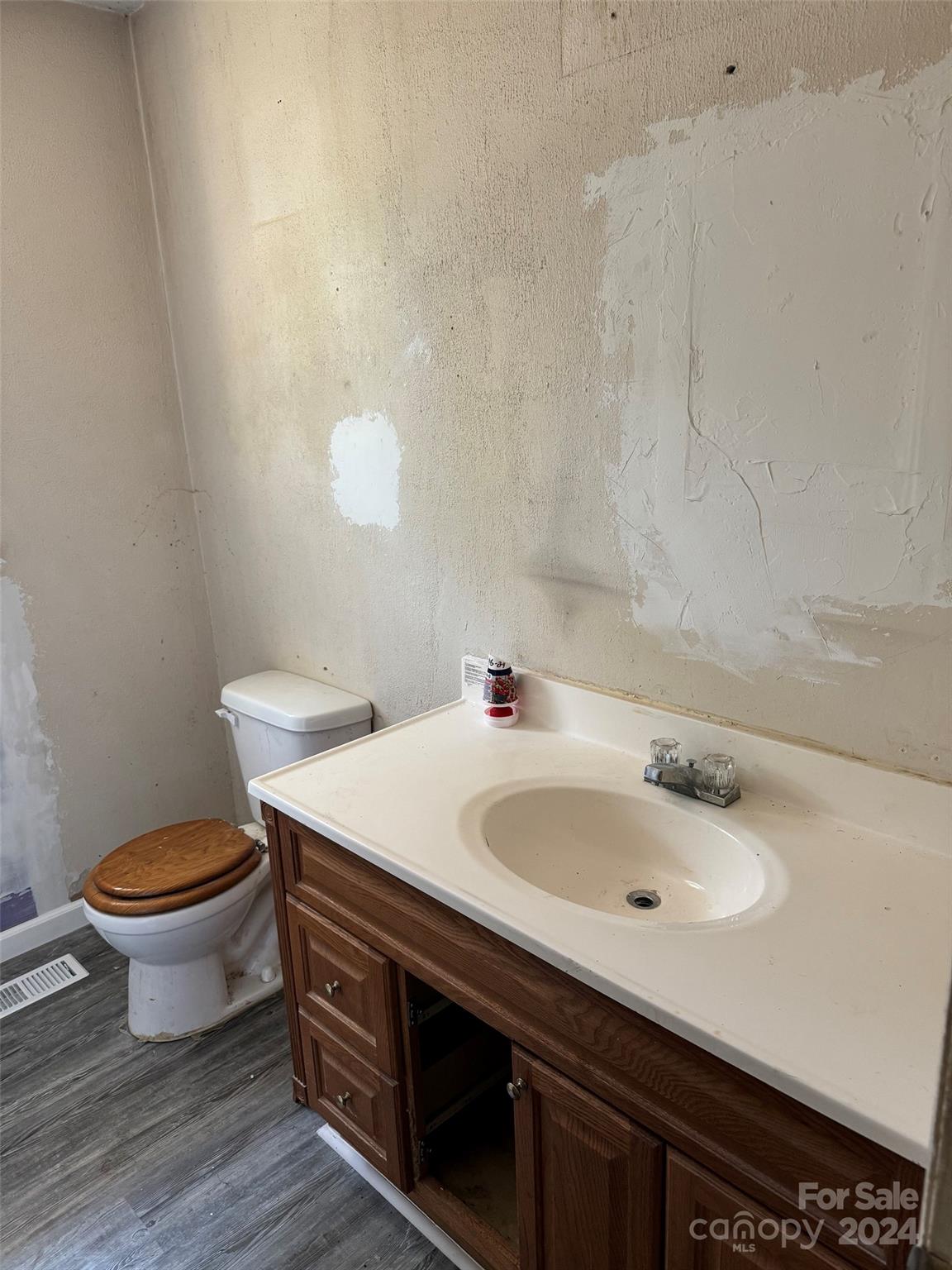 131 Kristy Lane Rockingham, NC 28379 - Photo 23 of 35 a bathroom with a sink and a toilet