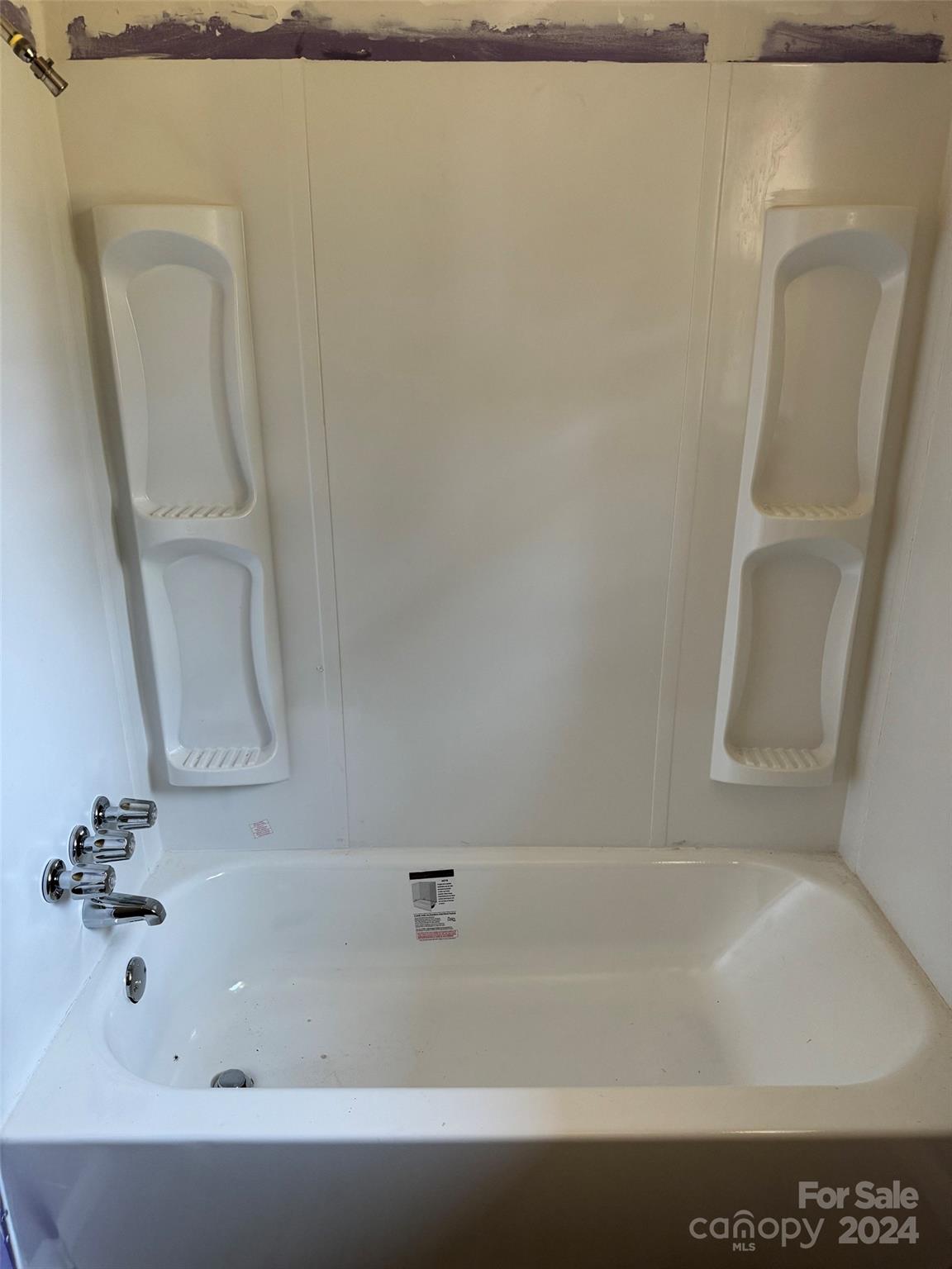 131 Kristy Lane Rockingham, NC 28379 - Photo 25 of 35 a bathroom with a bathtub