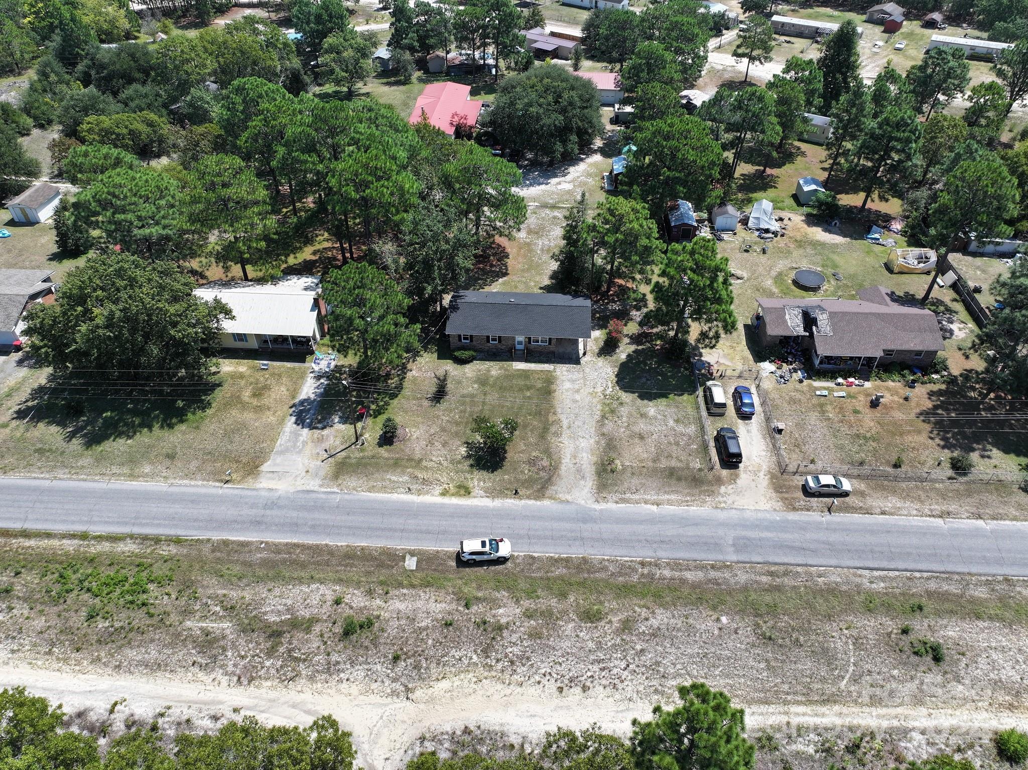 131 Kristy Lane Rockingham, NC 28379 - Photo 35 of 35 an aerial view of a house with a yard and garage