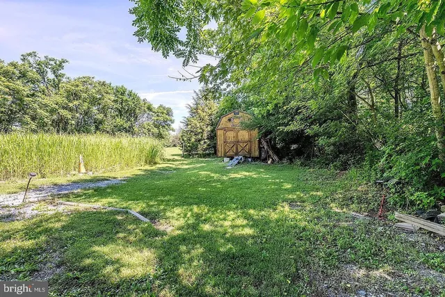 a view of a lake with a big yard