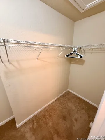 a view of small space with racks on the wall