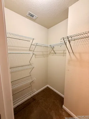 a view of a house with a ocean view