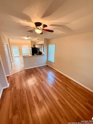 a view of a livingroom with a flat screen tv