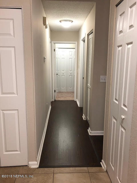 3801 Crown Point Road, Unit 1333 Jacksonville, FL 32257 - Photo 14 of 27 hallway from Kitchen to Bedrooms