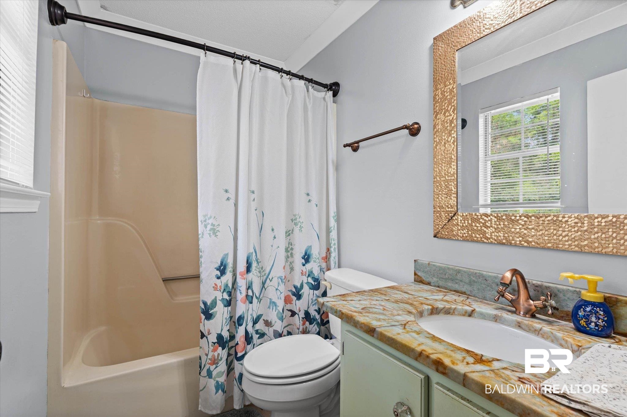 1849 Ranch House Drive Semmes, AL 36575 - Photo 14 of 23 Bathroom with vanity and shower / bath combo