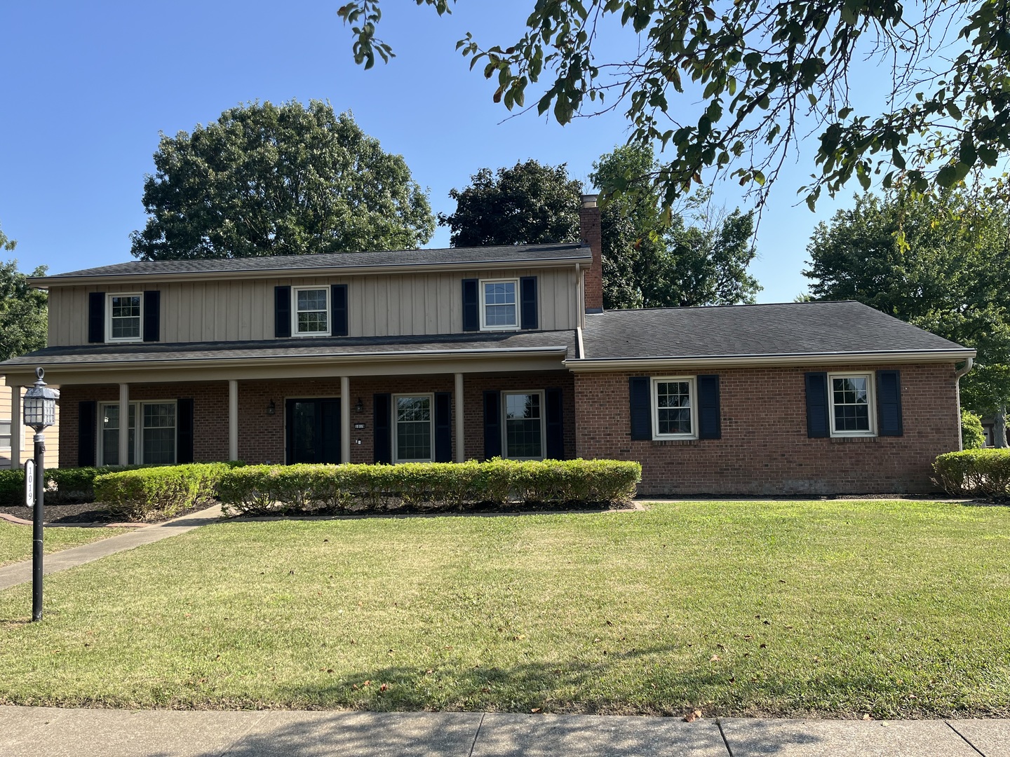 1019 Gregory Street Normal, IL 61761 - Photo 1 of 60 a front view of a house with garden