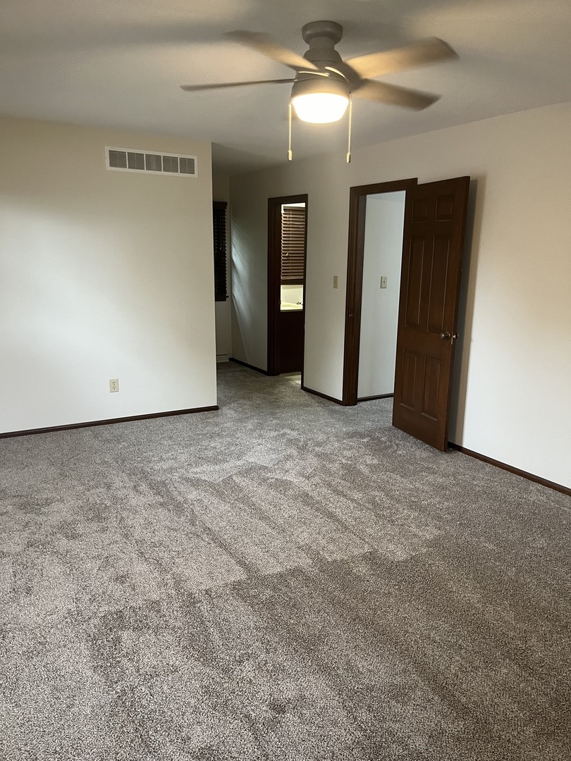 1019 Gregory Street Normal, IL 61761 - Photo 23 of 60 a view of an empty room