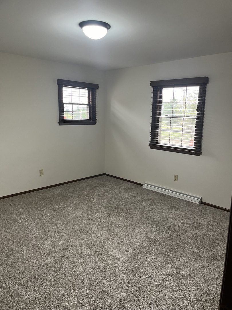 1019 Gregory Street Normal, IL 61761 - Photo 45 of 60 an empty room with a window