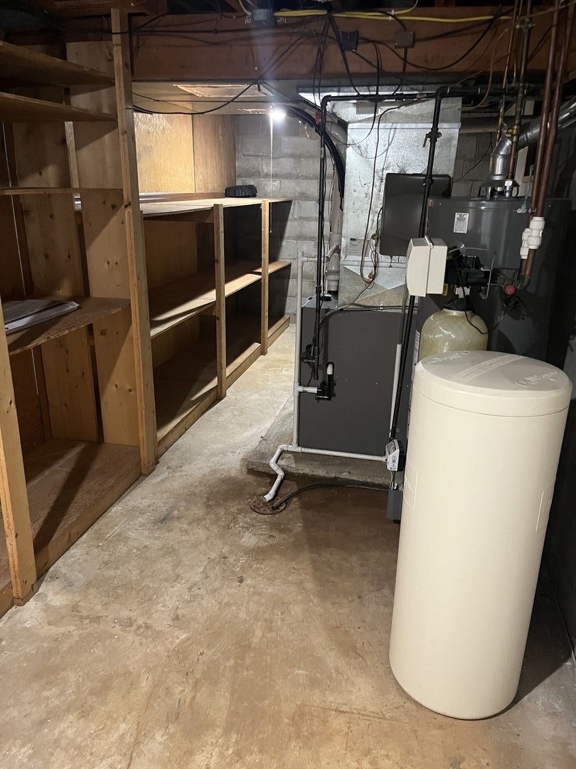 1019 Gregory Street Normal, IL 61761 - Photo 50 of 60 a view of a storage room with washer and dryer