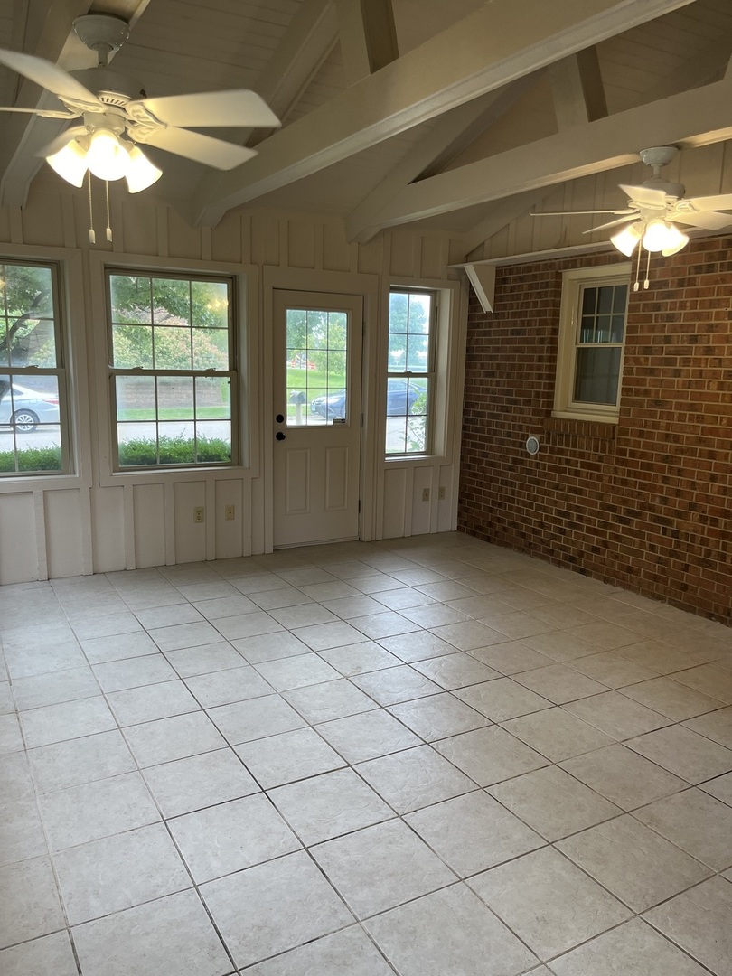 1019 Gregory Street Normal, IL 61761 - Photo 54 of 60 a view of an empty room with a window