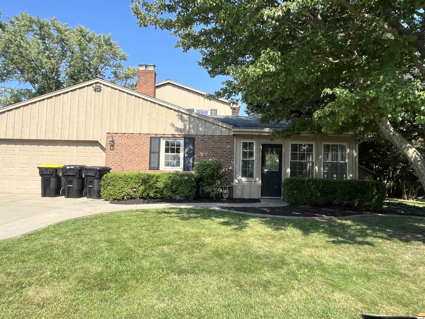 1019 Gregory Street Normal, IL 61761 - Photo 60 of 60 a view of a house with a yard and plants