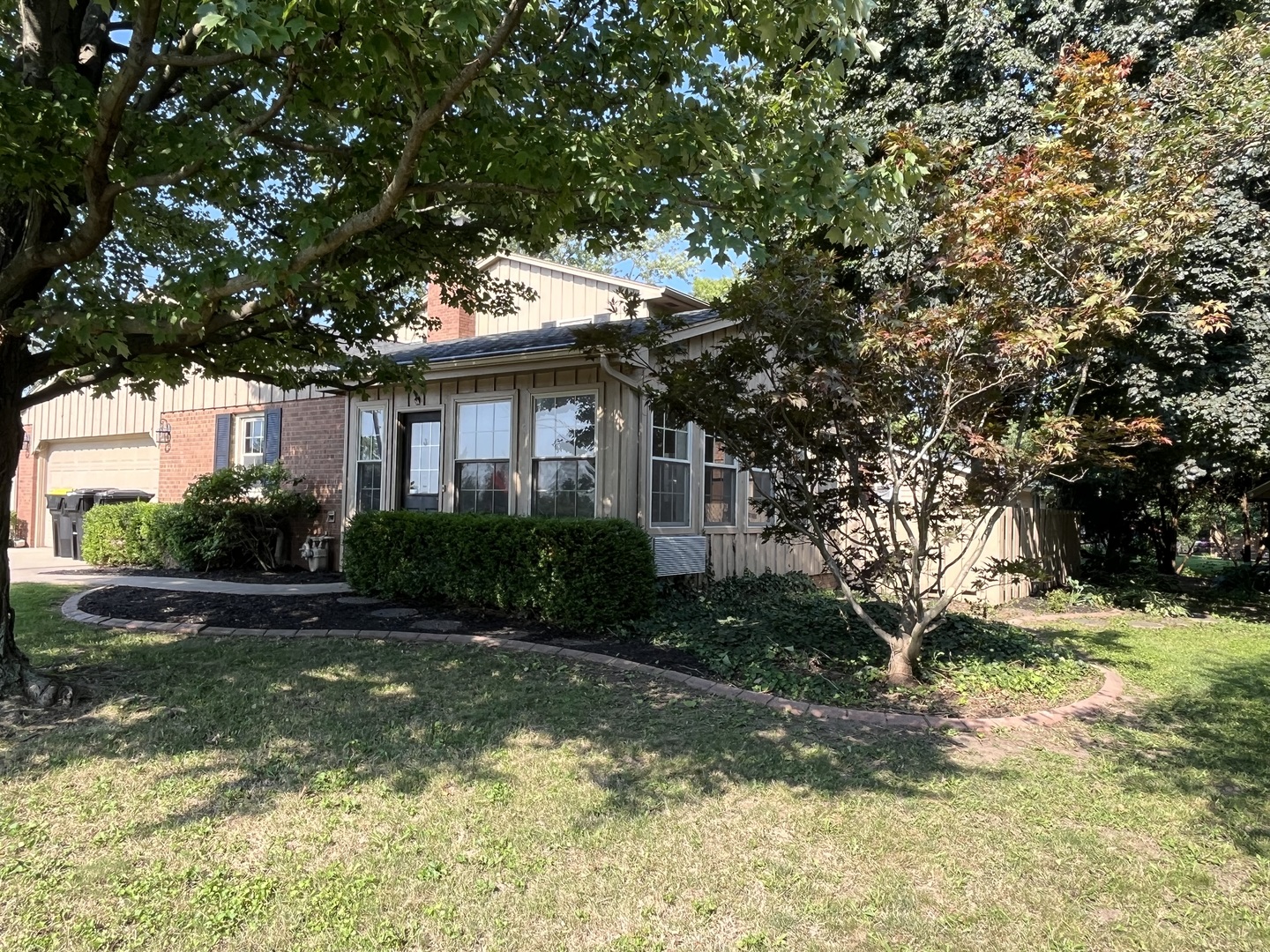 1019 Gregory Street Normal, IL 61761 - Photo 6 of 60 a view of house with yard outdoor space and swimming pool