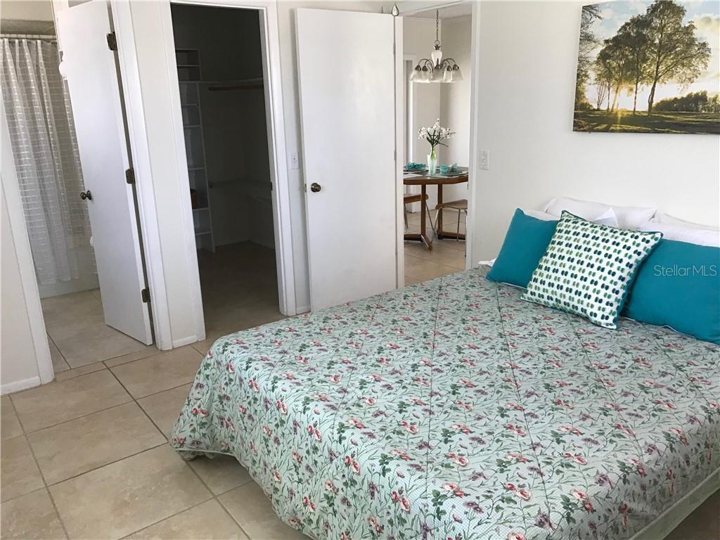 908 Royal Road Venice, FL 34293 - Photo 6 of 30 Master bed room showing master bath and walk in closet