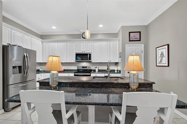 a bedroom with furniture and a book shelf
