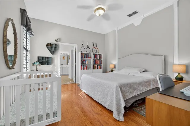 a bedroom with furniture and a window
