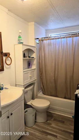 a bathroom with a toilet and a sink