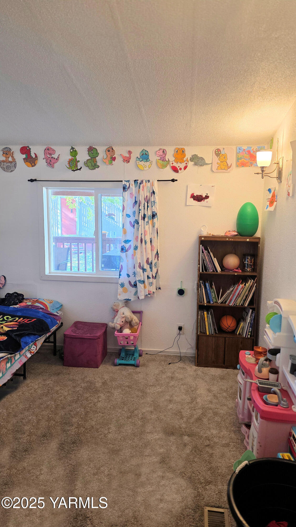1724 45th Avenue West, Unit A60 Kennewick, WA 99337 - Photo 9 of 11 a bedroom with furniture and a wooden floor