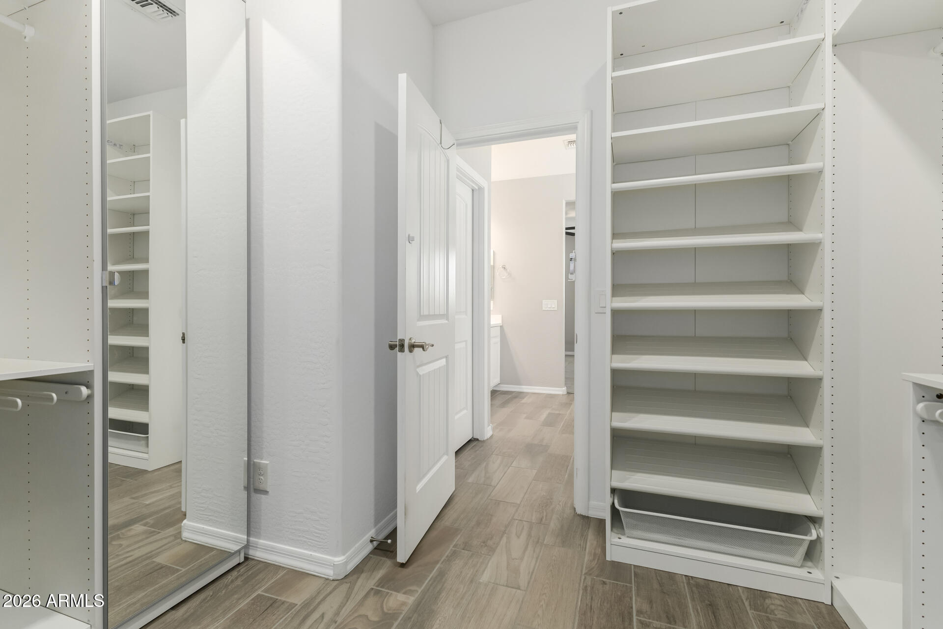 17771 West Granite View Drive Goodyear, AZ 85338 - Photo 21 of 35 a view of walk in closet with empty racks