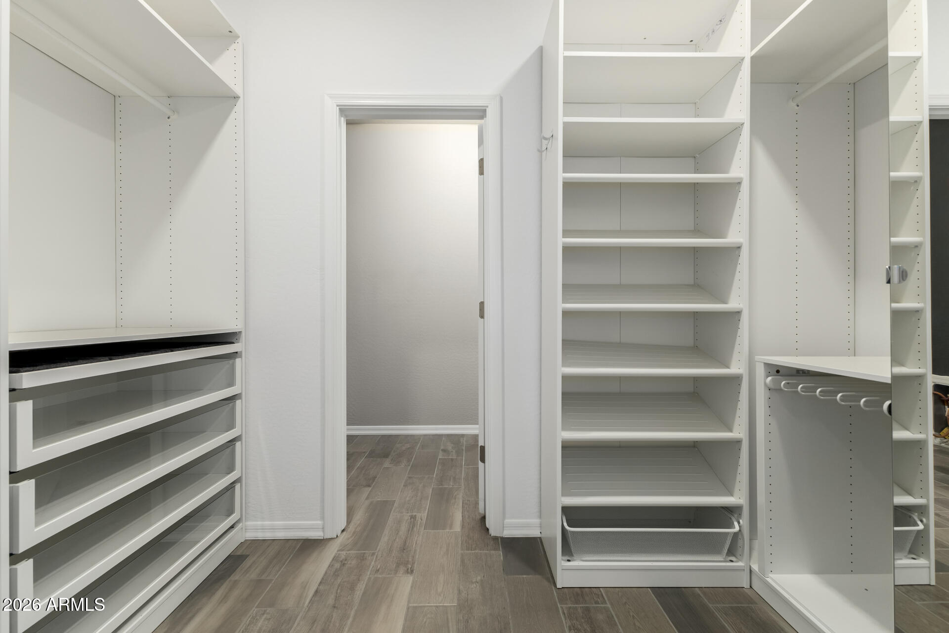 17771 West Granite View Drive Goodyear, AZ 85338 - Photo 22 of 35 a view of walk in closet with empty racks