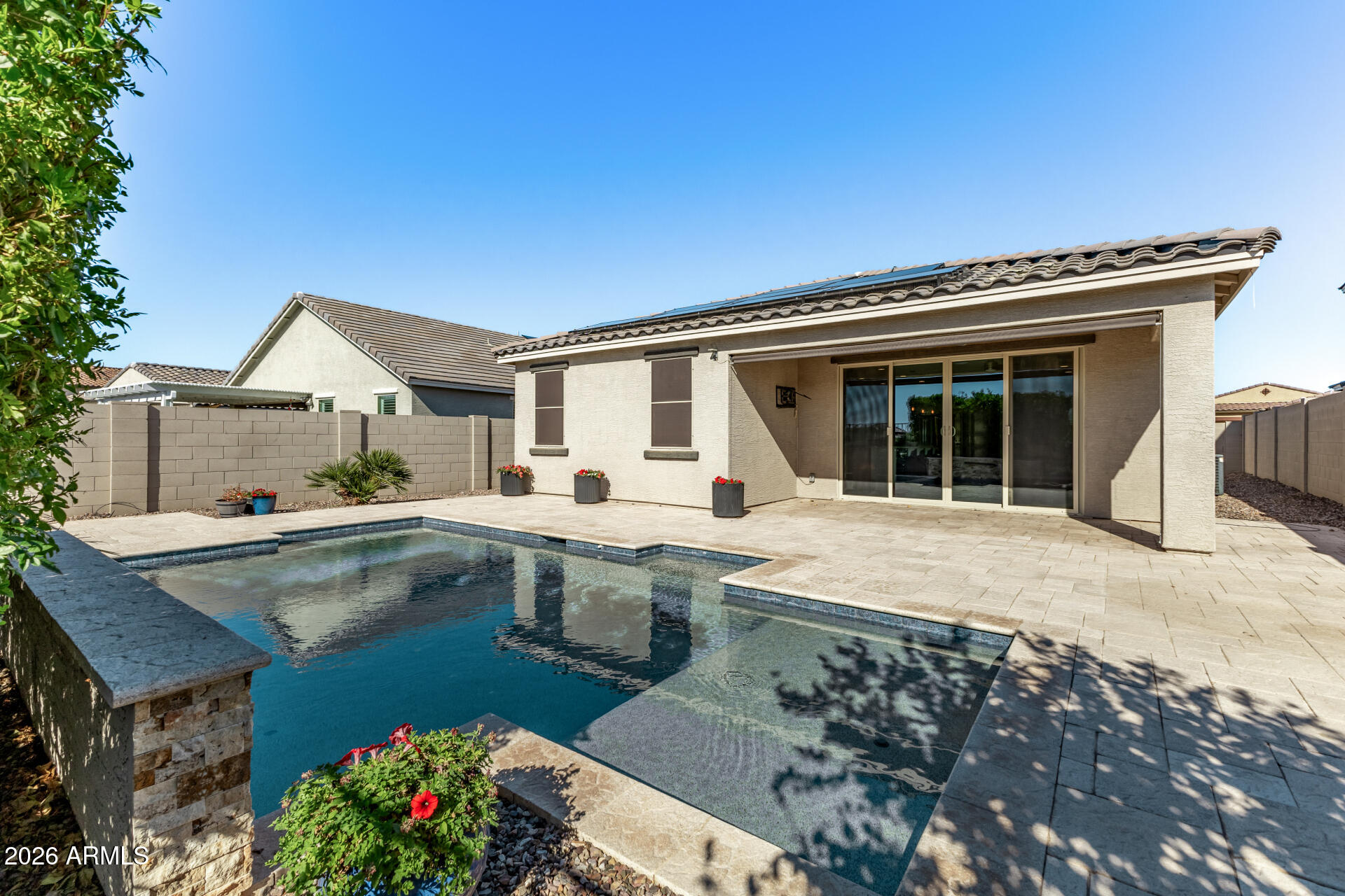 17771 West Granite View Drive Goodyear, AZ 85338 - Photo 35 of 35 a view of a house with pool and sitting area