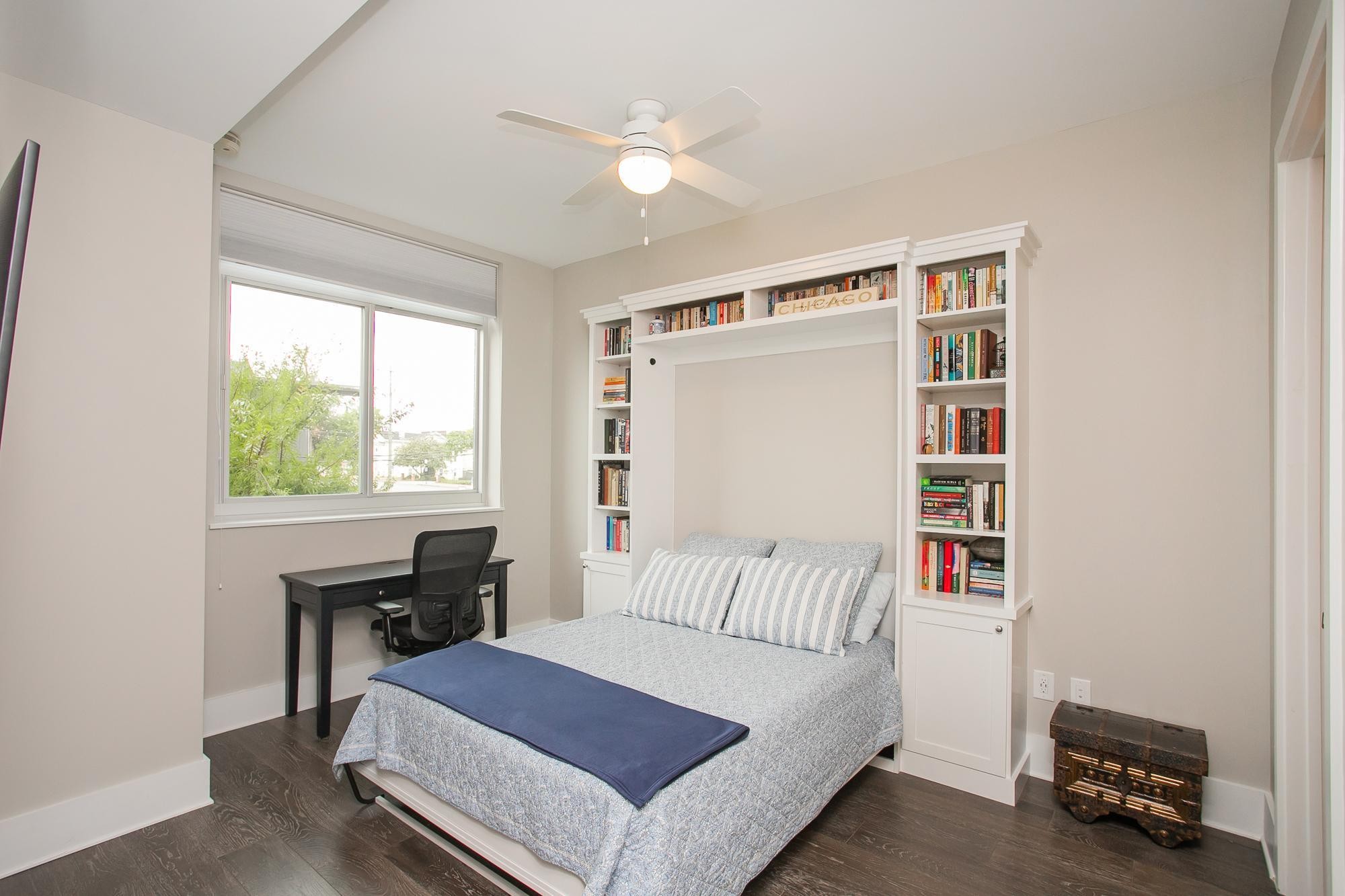 20 Rutledge Street, Unit 211 Nashville, TN 37210 - Photo 22 of 60 Secondary bedroom can also be converted easily into an office with the addition of the built-in custom Murphy bed.