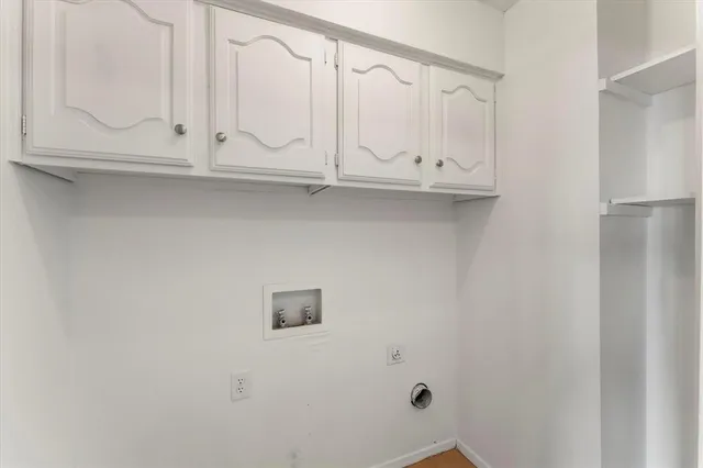 a bathroom with a sink vanity granite and a mirror