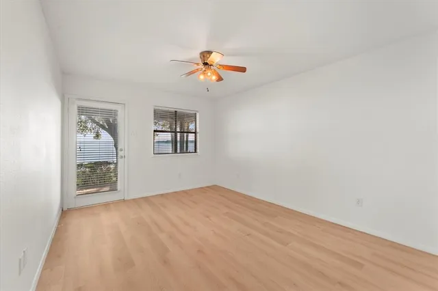 a bathroom with a double vanity sink mirror and shower