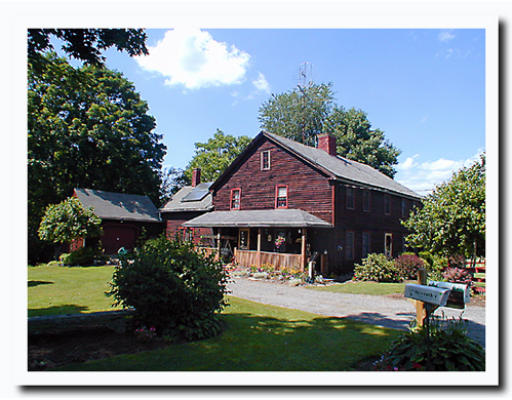 119 Old Sunderland Road Montague, MA 01351 - Photo 1 of 1 a view of an house with backyard space and garden