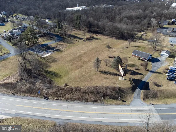 a view of a backyard of a house