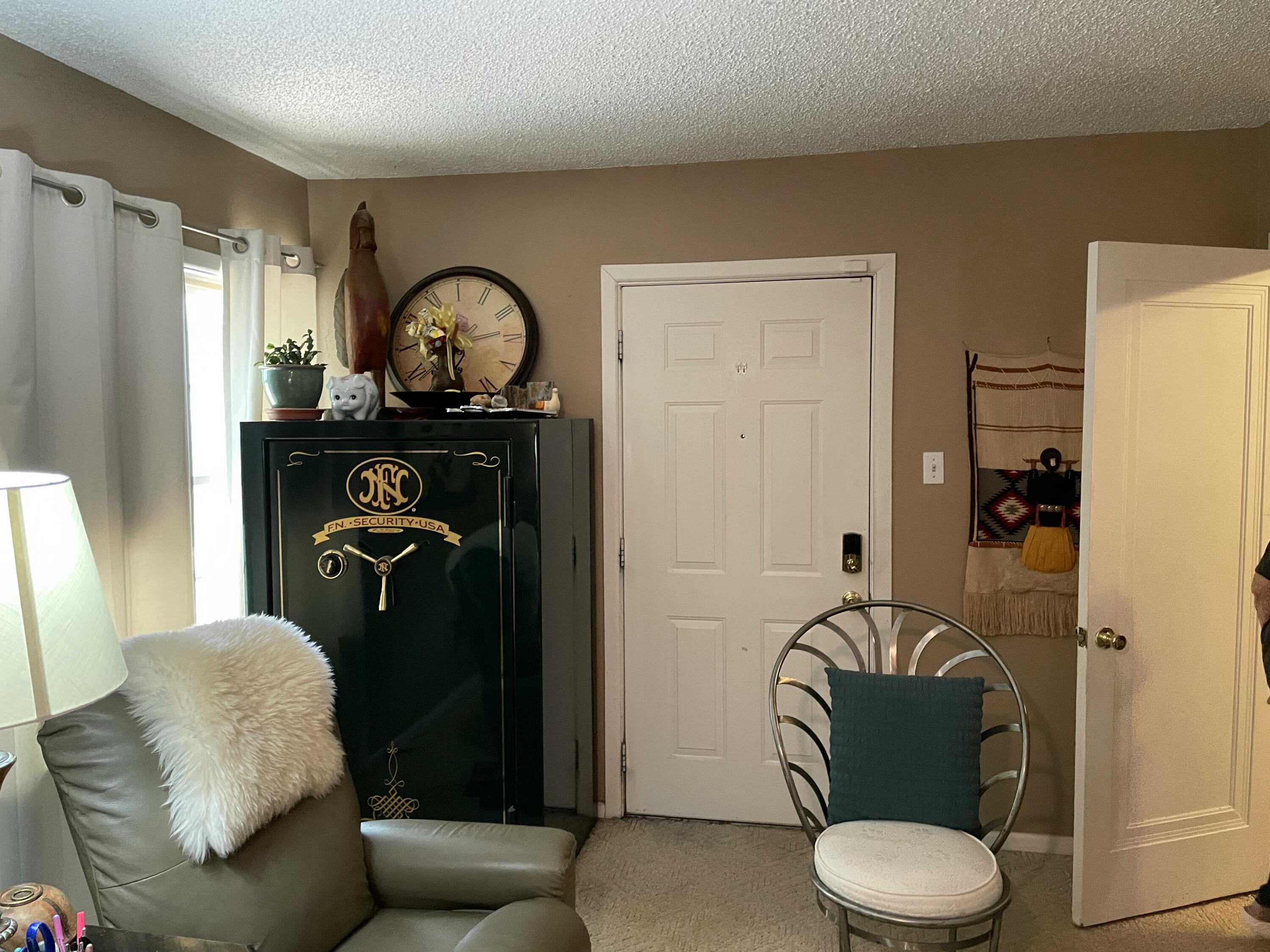 3206 21st Street Lubbock, TX 79410 - Photo 13 of 70 a living room with furniture and a window