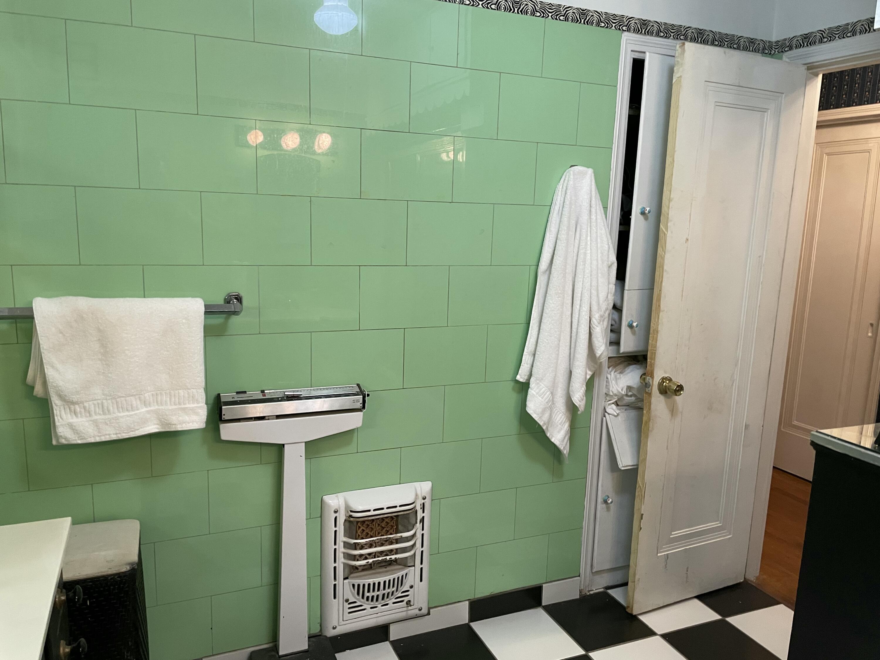 3206 21st Street Lubbock, TX 79410 - Photo 28 of 70 a bathroom with a sink and a mirror