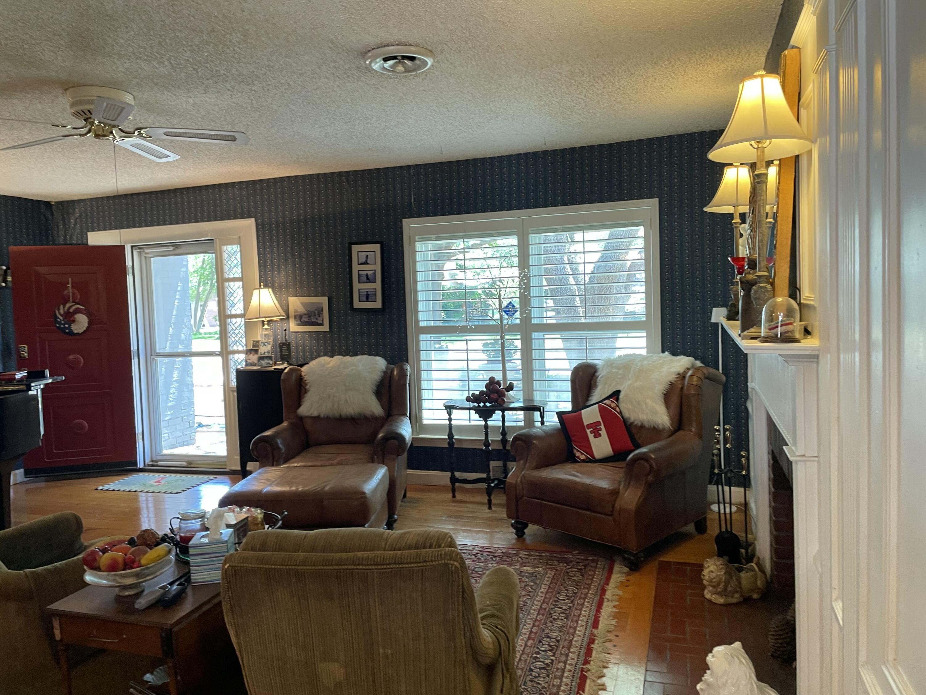 3206 21st Street Lubbock, TX 79410 - Photo 35 of 70 a living room with furniture and a large window