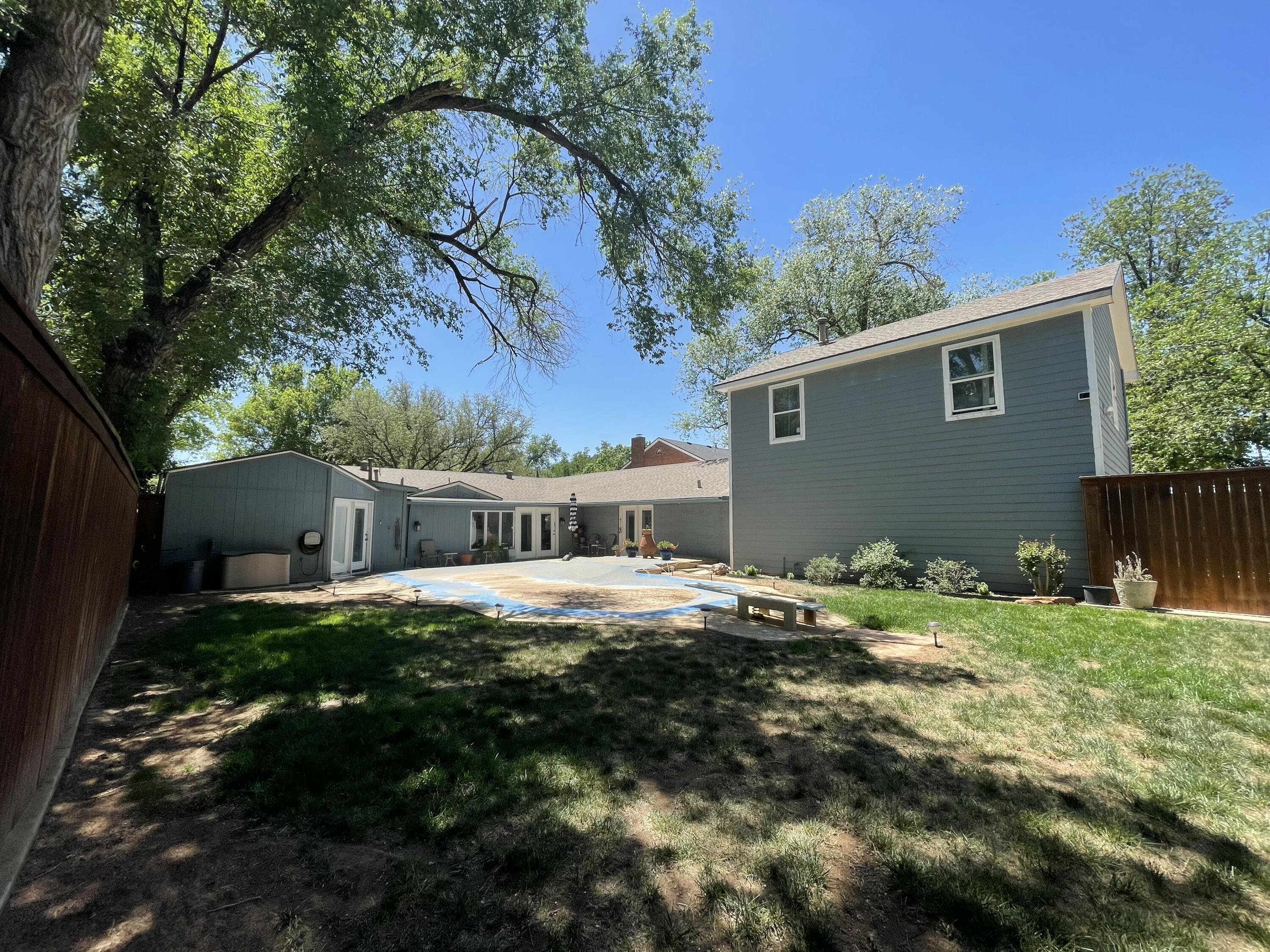 3206 21st Street Lubbock, TX 79410 - Photo 58 of 70 a backyard of house with green space
