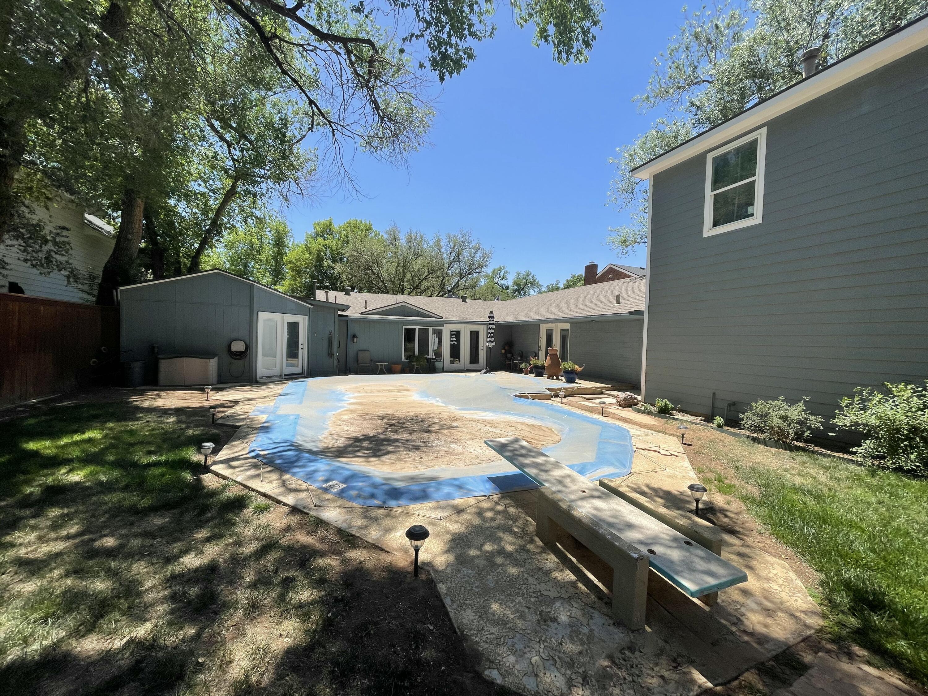 3206 21st Street Lubbock, TX 79410 - Photo 59 of 70 a house view with a backyard space
