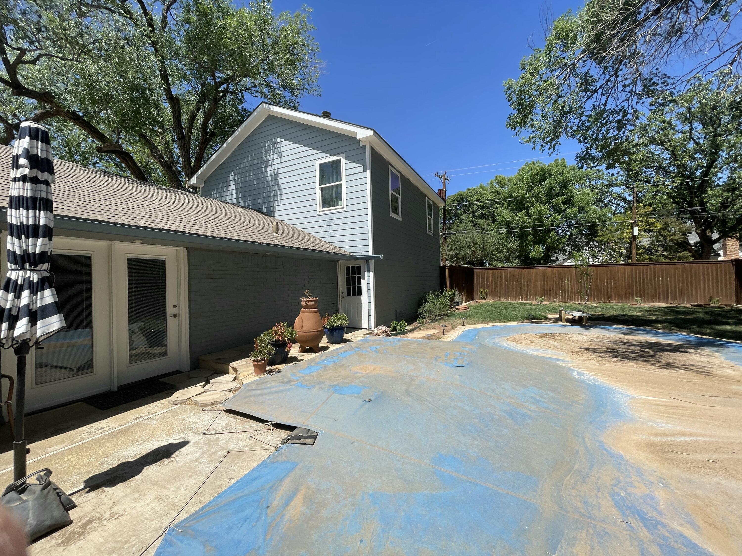3206 21st Street Lubbock, TX 79410 - Photo 62 of 70 a front view of a house with yard