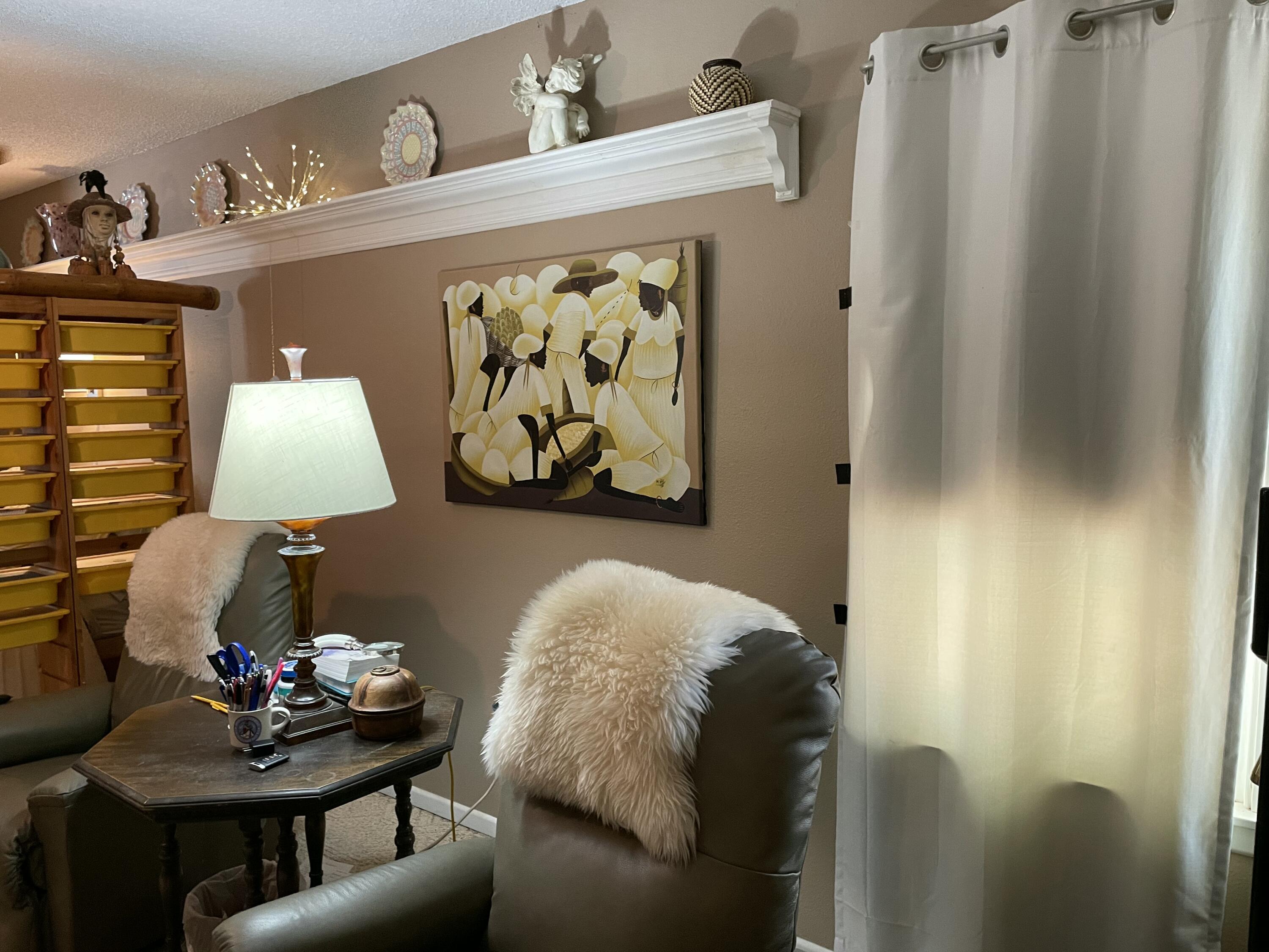 3206 21st Street Lubbock, TX 79410 - Photo 10 of 70 a living room with furniture and a table
