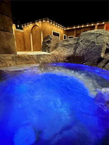 a front view of a house with lounge chair