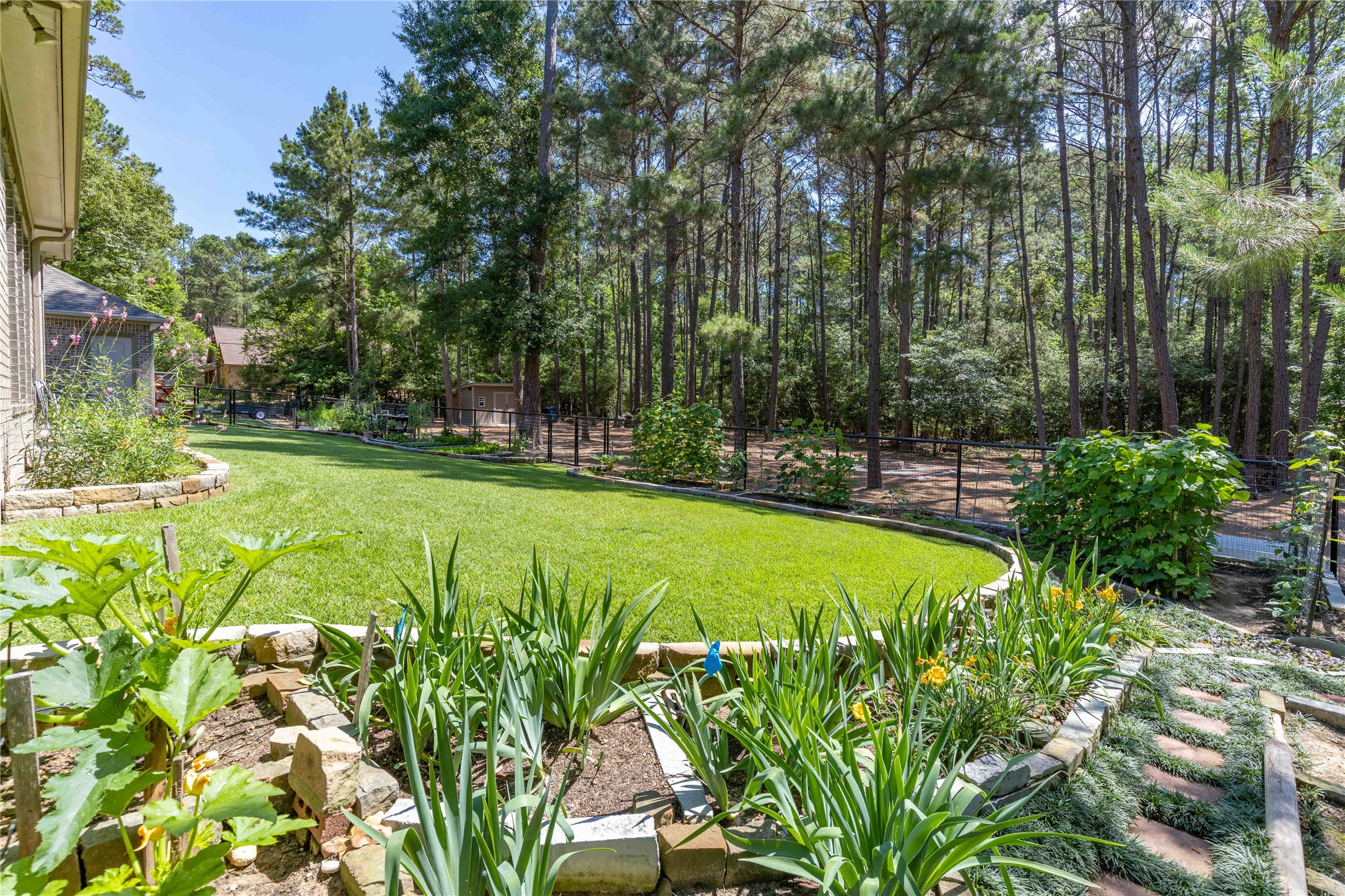 166 Rim Rock Road Huntsville, TX 77340 - Photo 41 of 50 Property extends beyond the fence, home is in center of properrty