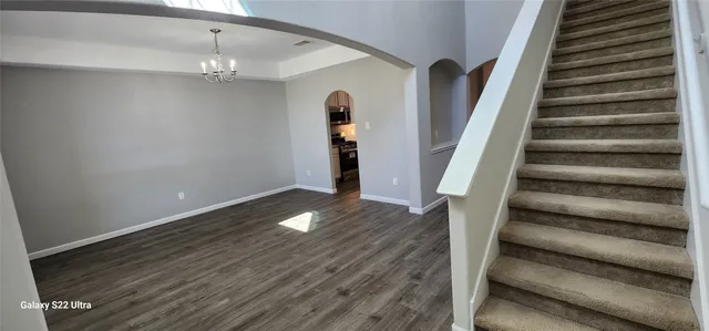 a view of entryway with wooden floor
