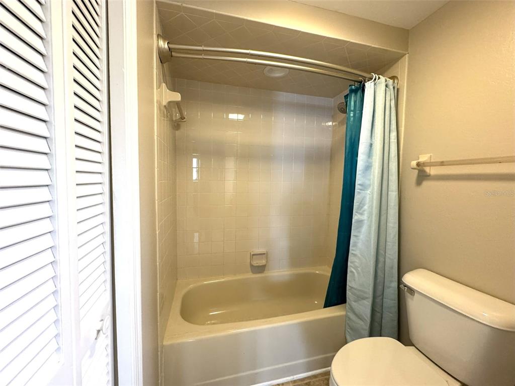 1226 Cypress Cove Court Inverness, FL 34450 - Photo 17 of 25 a bathroom with a shower and a toilet