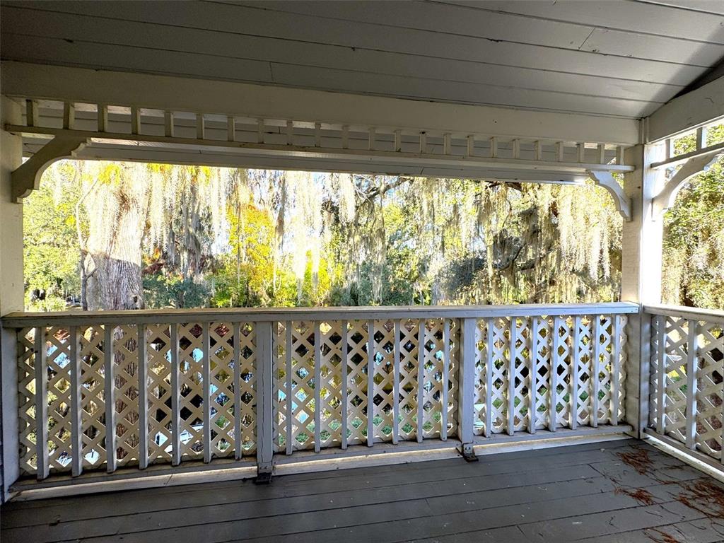 1226 Cypress Cove Court Inverness, FL 34450 - Photo 20 of 25 a view of a porch with wooden floor