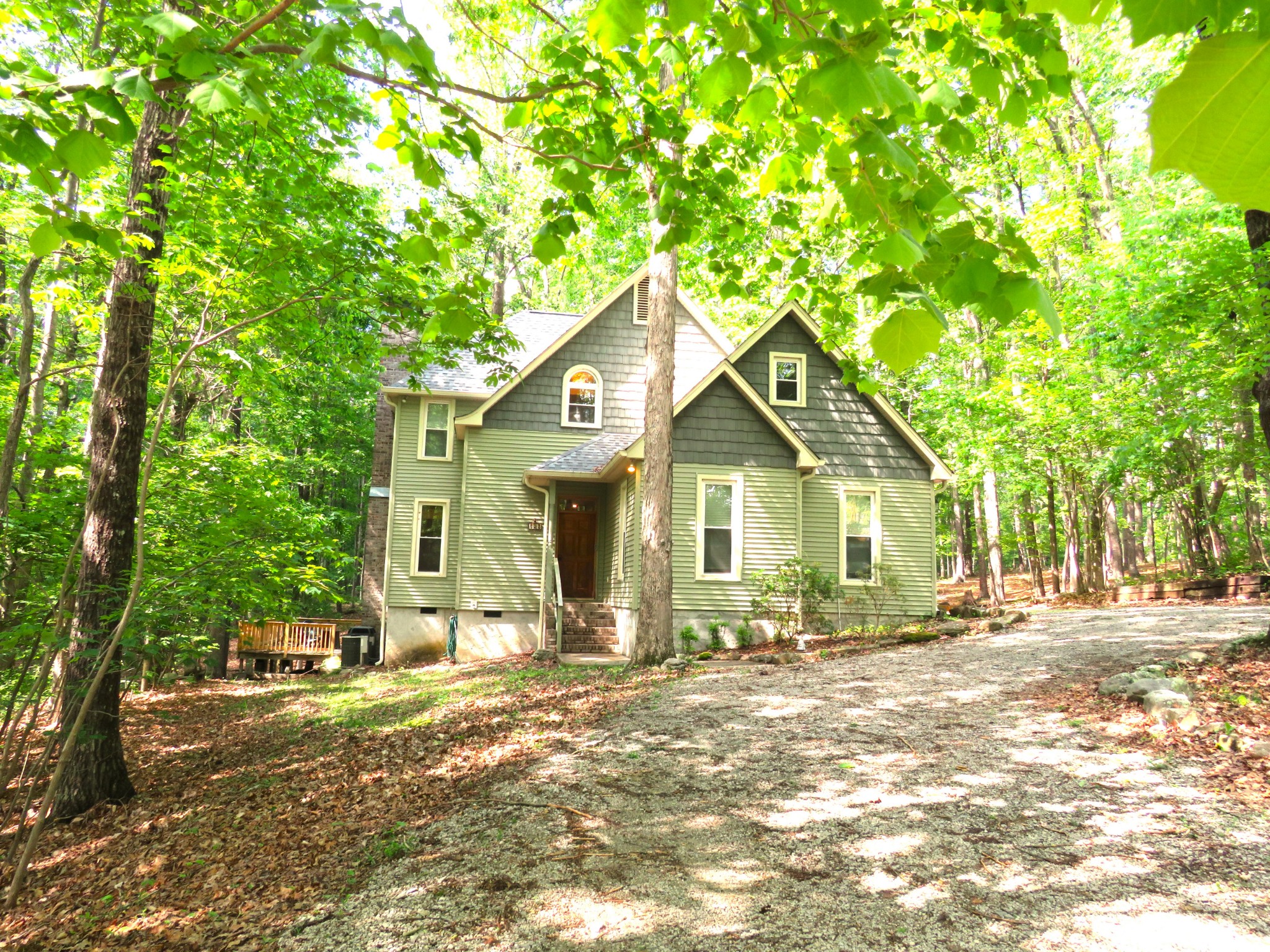 423 Bear Court Monteagle, TN 37356 - Photo 2 of 34 a front view of a house with a yard