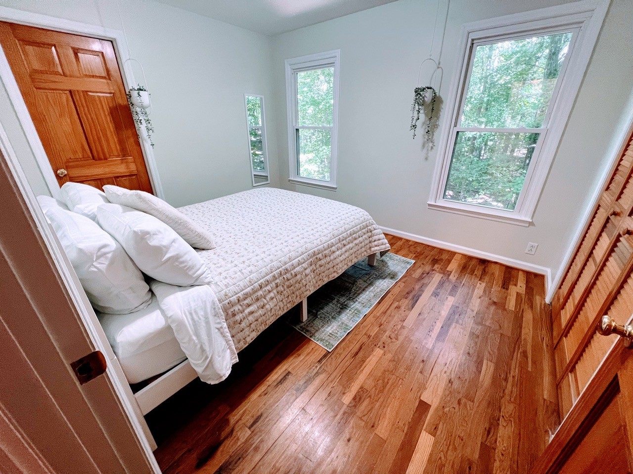 423 Bear Court Monteagle, TN 37356 - Photo 23 of 34 a bed sitting in a bedroom next to a window