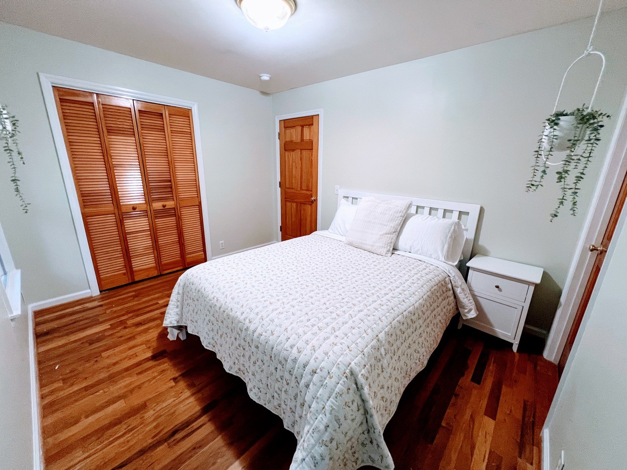 423 Bear Court Monteagle, TN 37356 - Photo 24 of 34 a bed sitting in a bedroom next to a window