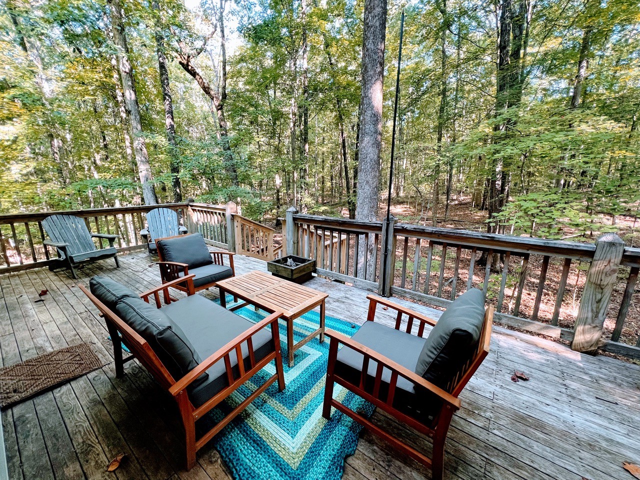 423 Bear Court Monteagle, TN 37356 - Photo 29 of 34 a view of a balcony with furniture and wooden floor