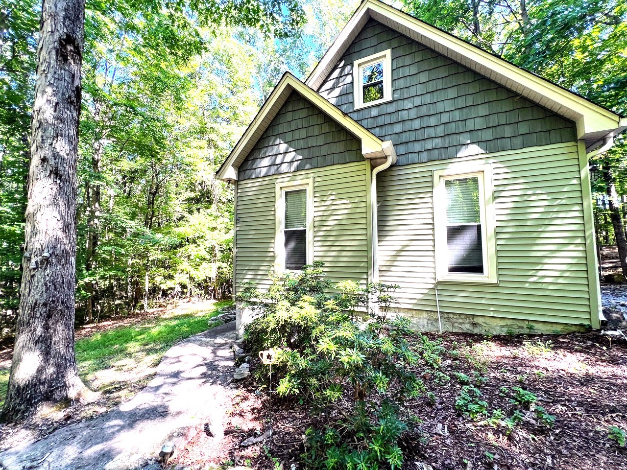 423 Bear Court Monteagle, TN 37356 - Photo 3 of 34 a view of a house with a yard