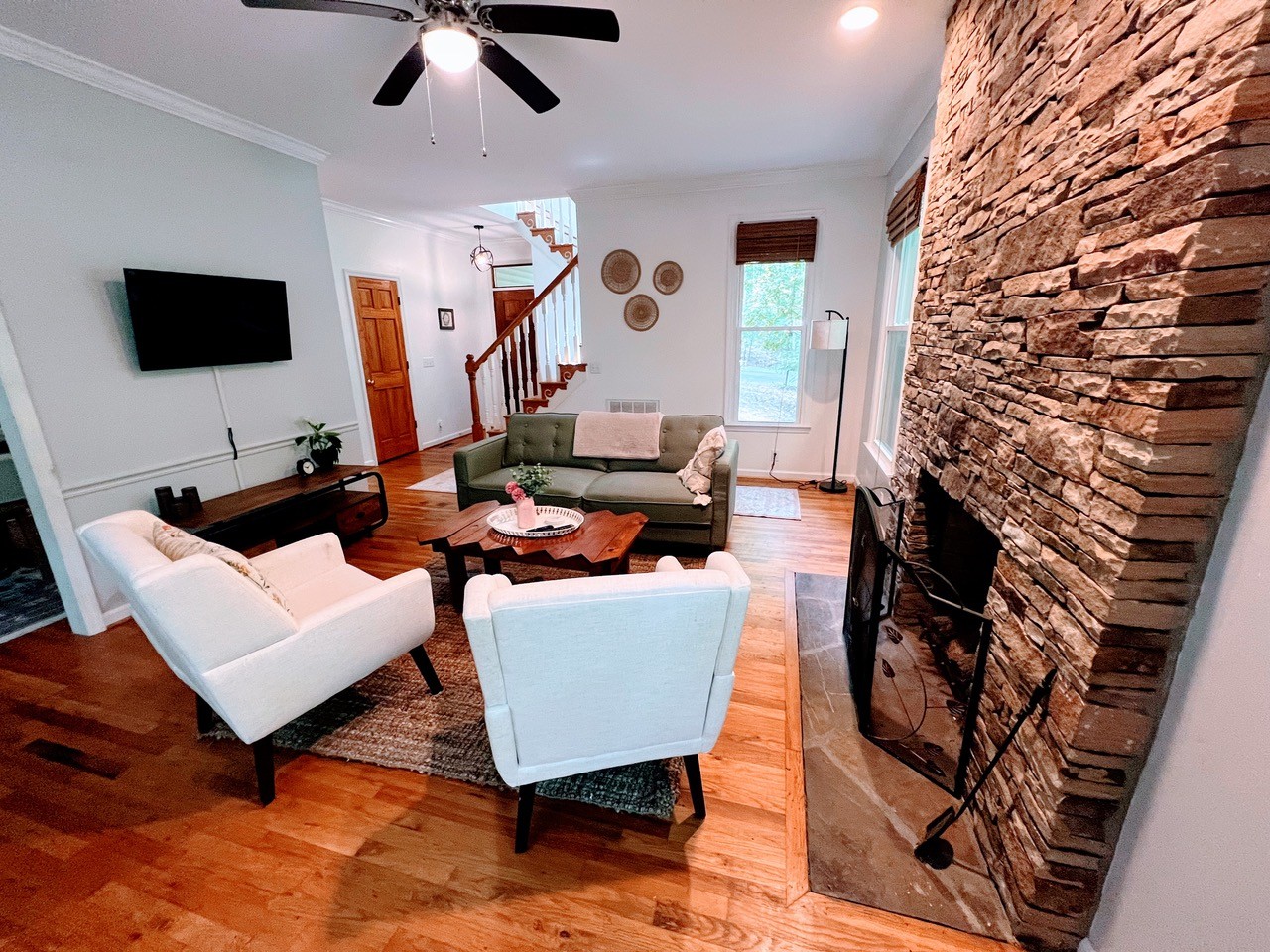 423 Bear Court Monteagle, TN 37356 - Photo 8 of 34 a living room with furniture and a flat screen tv