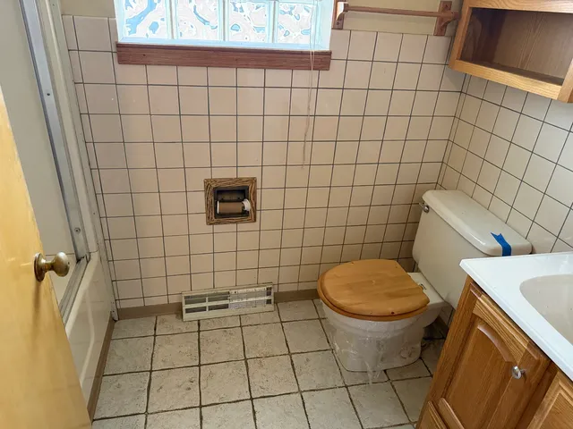 a bathroom with a sink and a toilet